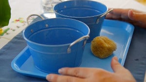Simple Montessori Activities: squeezing sponge